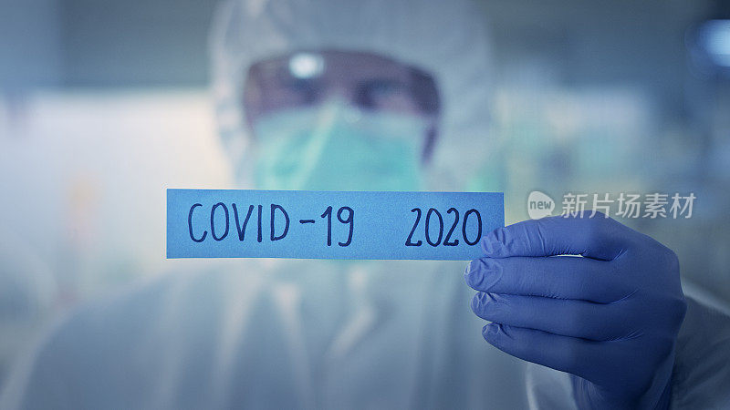 与2020年大流行概念作斗争。实验室工作人员放火“Covid-19 2020”